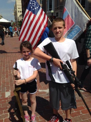 guns THIS PICTURE OF "OPEN CARRY TEXAS" CHILDREN CARRYING GUNS AT MAIN STREET ARTS FESTIVAL WAS PUBLISHED ON THE MERICANS AGAINST THE TEA PARTY WEB SITE.