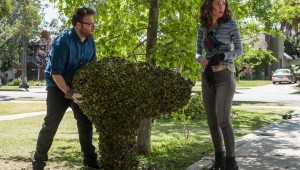 Seth Rogen and Rose Byrne find their shrubbery carved into a rude shape by the frat next door in Neighbors.