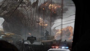 Seen through a bus window, the renowned Japanese monster visits the Golden Gate Bridge in Godzilla.