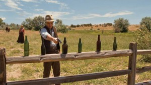 Seth MacFarlane takes target practice from a manageable distance in A Million Ways to Die in the West.