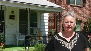 An apartment building looms over Linda Bridwell’s home. Jeff Prince