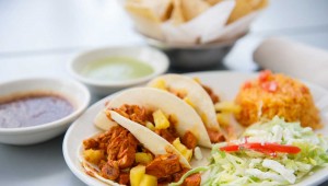 There are dozens of taco items at Taco Diner, including the citrus- marinated pork tacos al pastor — with grilled pineapple. Brian Hutson