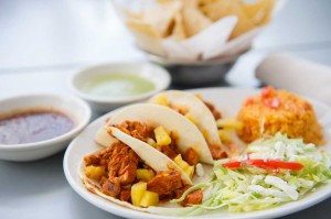 EATS There are dozens of taco items at Taco Diner, including the citrus- marinated pork tacos al pastor — with grilled pineapple. Brian Hutson