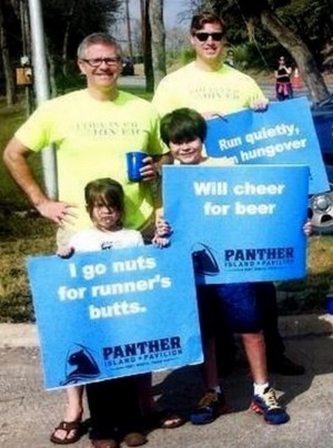 jd granger TRINITY RIVER VISION SPOKESMAN MATT OLIVER (BACK LEFT) AND J.D. GRANGER (BACK RIGHT) AND GRANGER'S CHILDREN CHEER ON RUNNERS AT THE COWTOWN MARATHON EARLIER THIS YEAR.