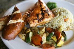 EATS Offerings like the grilled chicken plate with house sage butter, rice pilaf, and veggies prove that there’s more to Dalton’s Corner than foot-high beers. Lee Chastain