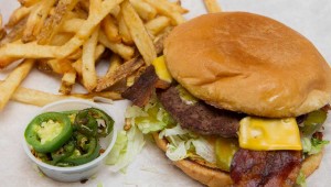 The sandwiches, like this bacon cheeseburger, aren’t fancy, but they are tasty and very wallet-friendly. Brian Hutson