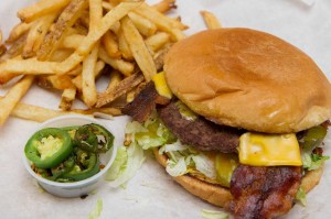 EATS The sandwiches, like this bacon cheeseburger, aren’t fancy, but they are tasty and very wallet-friendly. Brian Hutson