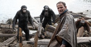 film 2 Jason Clarke (foreground) tries to make peace with our new primate overlords in Dawn of the Planet of the Apes.
