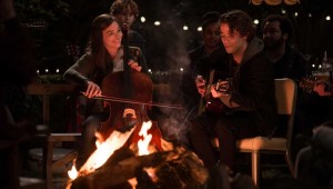 Chloë Grace Moretz and Jamie Blackley jam around a campfire in If I Stay.