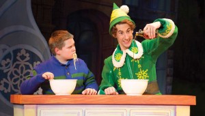 Connor Barth and Matt Kopec enjoy a pasta dinner in “Elf: The Musical.”