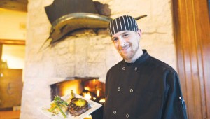 Executive chef Jordan Ray delivers a 16-oz. rib-eye finished in a 900-degree pizza oven, topped with truffle-saffron butter and accompanied by a jalapeño grit cake and grilled asparagus. Vishal Malhotra