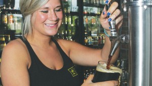 World of Beer bartender Hays has a pint with your name on it. Photo by Lee Chastain.