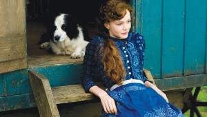 With a faithful border collie, Carey Mulligan surveys her holdings in Far From the Madding Crowd.