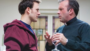 Justin Lemieux and Jakie Cabe have an ecclesiastical disagreement in Circle Theatre’s Mass Appeal.