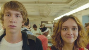 Thomas Mann and Olivia Cooke prepare to face the cafeteria chaos in Me and Earl and the Dying Girl.