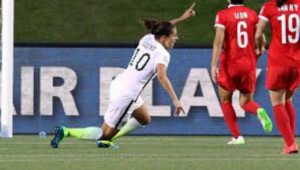 Carli Lloyd wheels away after scoring the winning goal for USA against China.