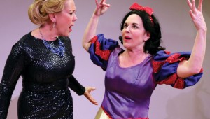 Wendy Welch (dressed as the Wicked Queen) and Shannon J. McGrann (dressed as Snow White) bicker on their way to a costume party in Vanya and Sonia and Masha and Spike.