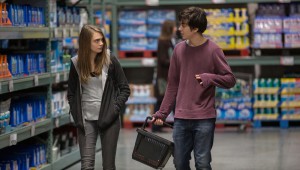 Cara Delevingne and Nat Wolff share a meaningful moment in a big-box retail store in "Paper Towns."
