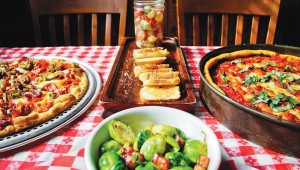 Gino’s East serves traditional Chicago pizzeria fare in a kitschy setting. Photo by Jordan Ricaurte.