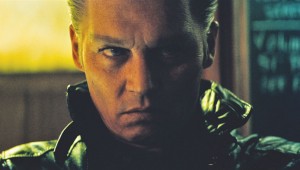 Johnny Depp ponders his next criminal misdeed in Black Mass.