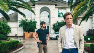 Andrew Garfield and Michael Shannon eyeball a potential new property in 99 Homes.