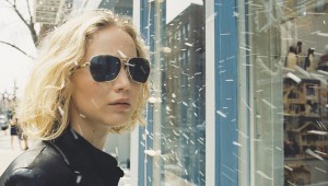 Joy to the world! Jennifer Lawrence celebrates the holiday under fake snow.