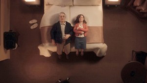 Michael and Lisa lie on a hotel bed during a brief encounter in Anomalisa.