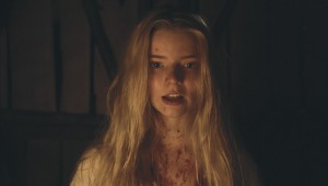 A blood-spattered Anya Taylor-Joy looks to Hell for guidance in The Witch.
