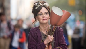 Clutching a lamp pulled from the trash, Sally Field makes her way home in Hello, My Name Is Doris.
