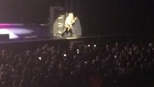 THIS PHOTO OF ZAKK WYLDE PLAYING 32 MILLION NOTES PER SECOND IS FAR AWAY, DARK, HAZY, AND SLIGHTLY OUT OF FOCUS. BUT COMPARED TO WYLDE'S GUITAR PLAYING, THIS PHOTO IS LIKE THE "MONA LISA" AND "THE STARRY NIGHT" COMBINED. (photo by james michael taylor)