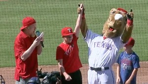 Rush Olsen and Rangers Captain have fun with the crowd before games at the ballpark.