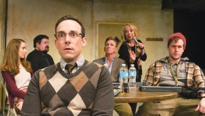 Curtis Raymond Shideler (foreground left) tries to placate a restive cast in Circle Theatre’s Don’t Talk to the Actors.