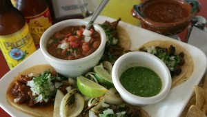 Papaya’s street taco sampler is big on flavor and low on cost. Photo by Lee Chastain.
