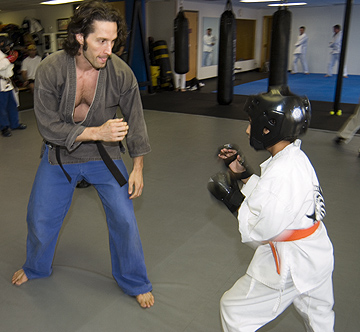 Mezger, left, with a student: ‘I remember one kick-boxer knocked the teeth out of a sumo wrestler in the ring.’