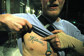 ‘Joshua’ shows off his new tattoo on Decatur Street, a month after Katrina hit.