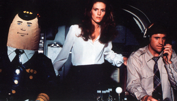 A kinky inflatable pilot flies ‘Airplane!’ with Julie Hagerty and Robert Hays.