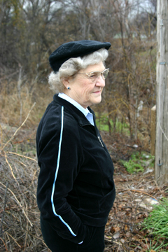 Julia Burgen wistfully views a changing Johnson Creek.