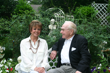 Betty and Jim Wright relax in the ornate backyard of their Fort Worth home.
