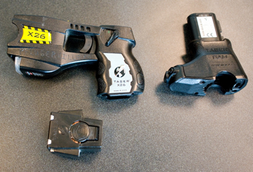 The Pflugerville Police Department chose to equip all of its Tasers with cameras (the attachment at right in bottom photo).