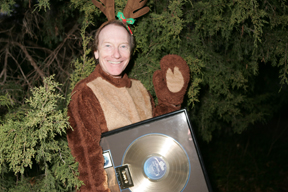 Brooks, in reindeer suit with his gold record: “Never overestimate the taste of the public.”