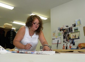 Kelli Belindo designs clothing at her space in The Work Room on Race Street.  Lisa Maria Garza