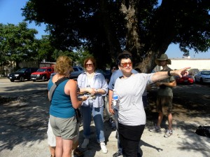 FEATURE-4 Stein (pointing) and a group of volunteers plan the layout of the community garden. Lisa Maria Garza