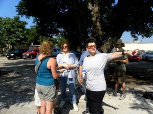 Stein (pointing) and a group of volunteers plan the layout of the community garden.  Lisa Maria Garza