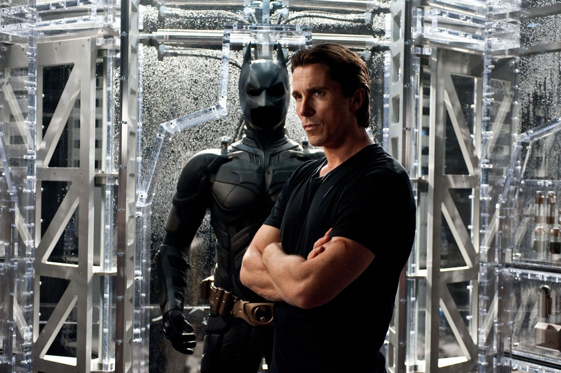 Christian Bale ponders the end of Batman in The Dark Knight Rises.