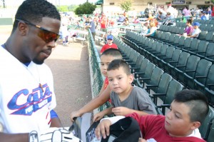 Children have little trouble wangling autographs at LaGrave Field.