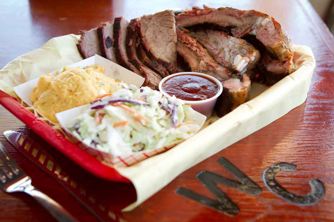 Pork ribs and brisket liven up this two-meat plate at Woody Creek. Tony Robles