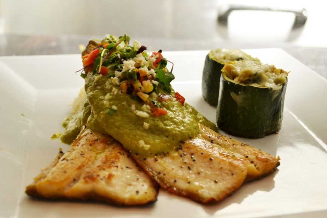 Pan seared trout with avocado-poblano salsa from Hacienda San Miguel. Photo courtesy Facebook