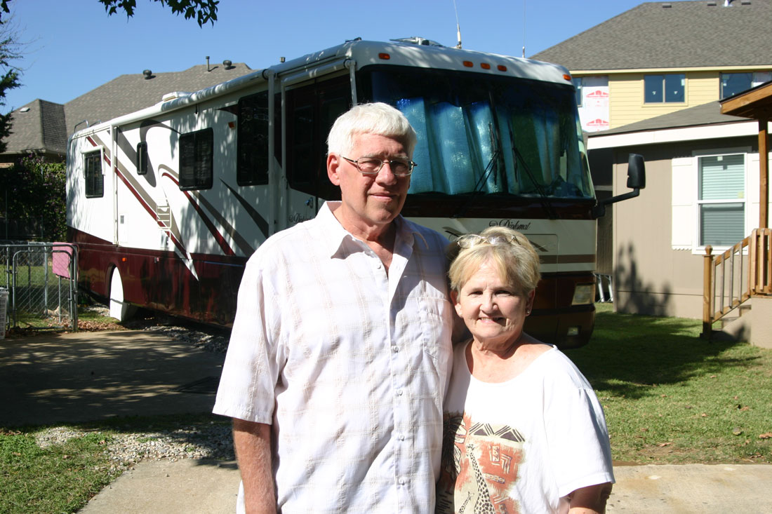 Richard and Ginger Moore are living in the recreational vehicle behind them. Jeff Prince