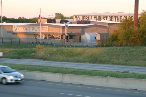 Larry Buck praises Jesus at his awning business on East Loop 820.