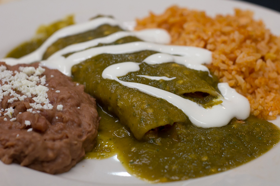 Los Paisanos’ chicken enchiladas are simple and tasty. Chase Martinez
